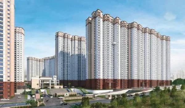 Sarjapur Road property price 2026 — apartment towers along the corridor
